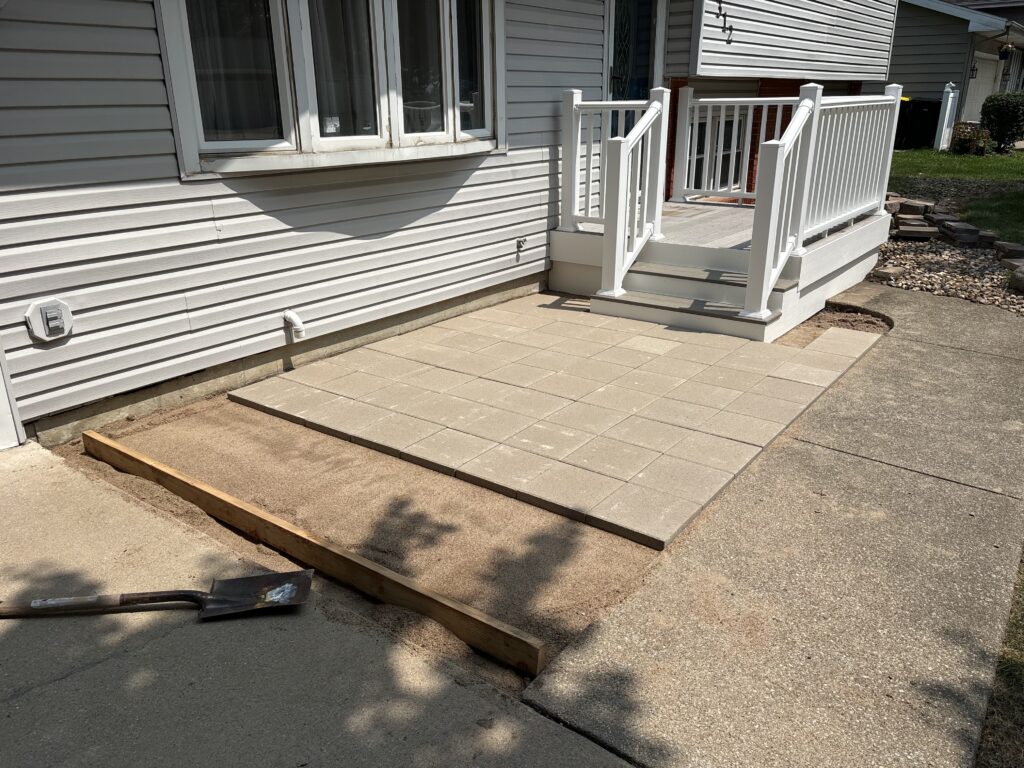 Porch Railing and Patio Paver Replacement in Normal — patio transformation